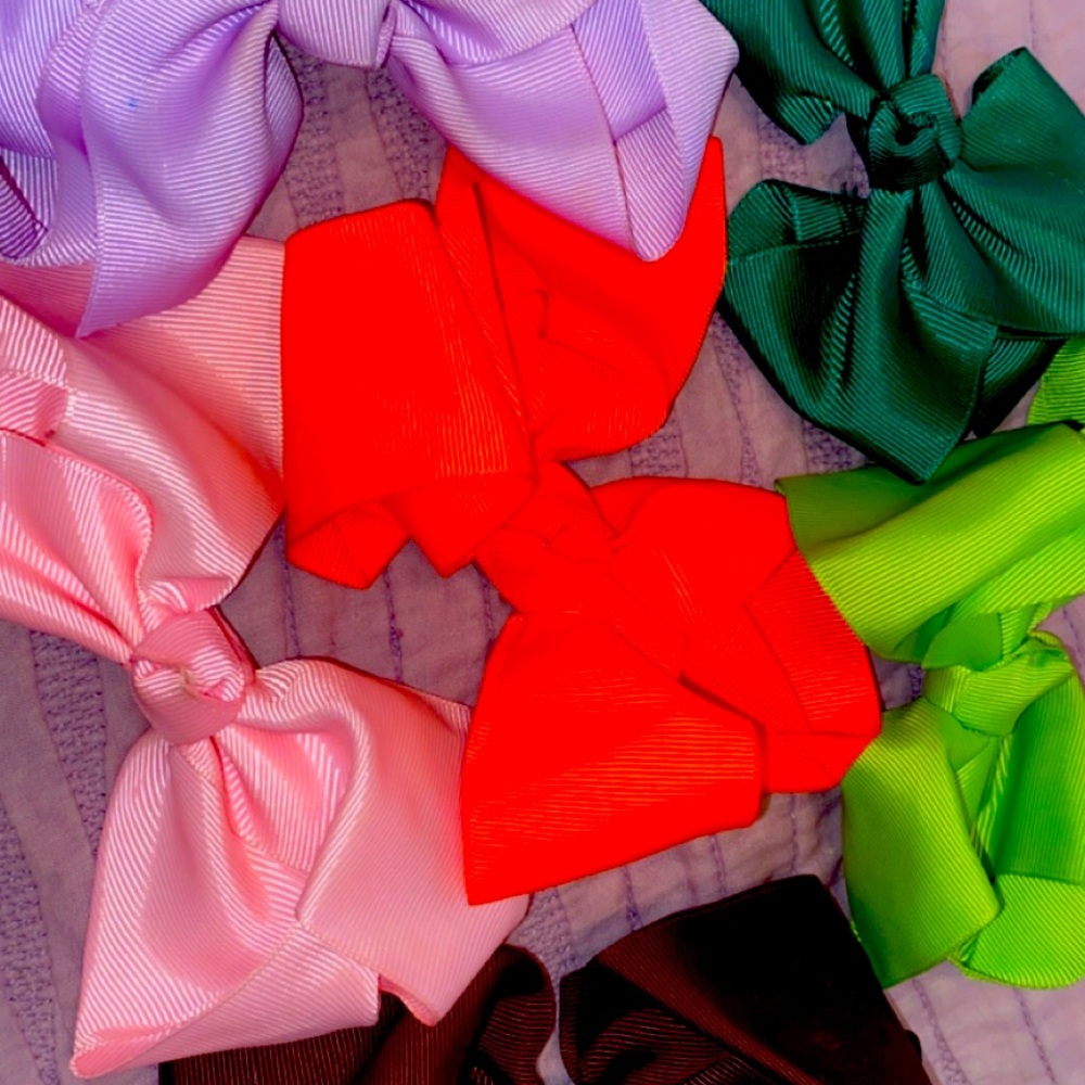 Hey guys these are 6 bows brown, purple, pink , orange, green